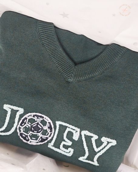 Green sweater featuring the name "JOEY" and a football graphic.