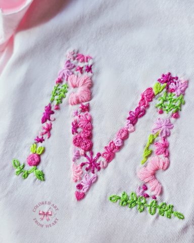 Twin Gardens - Personalised T-shirts for Twin Baby Girls Two soft T-shirts for twin girls, each embroidered with a floral initial