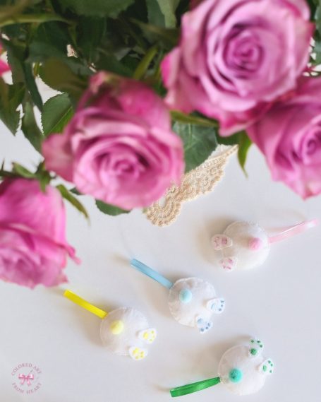 Collection of four funny bunny backsides charms in white and pastel colours.