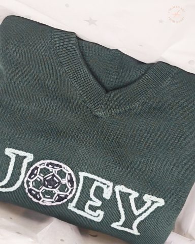 Football Lover Joey - Personalised Sweater Green sweater featuring the name "JOEY" and a football graphic.