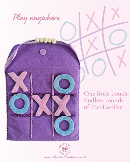 Purple pouch featuring a portable Tic-Tac-Toe game with blue and pink tokens.