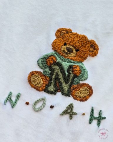 Teddy Noah - Peronalised Bodysuit for Baby Boy A soft white bodysuit, personalised with name and hand-embroidered teddy bear