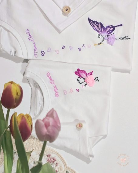 Two white "mother and daughter" matching T-shirts embroidered with mother fairy and daughter fairy